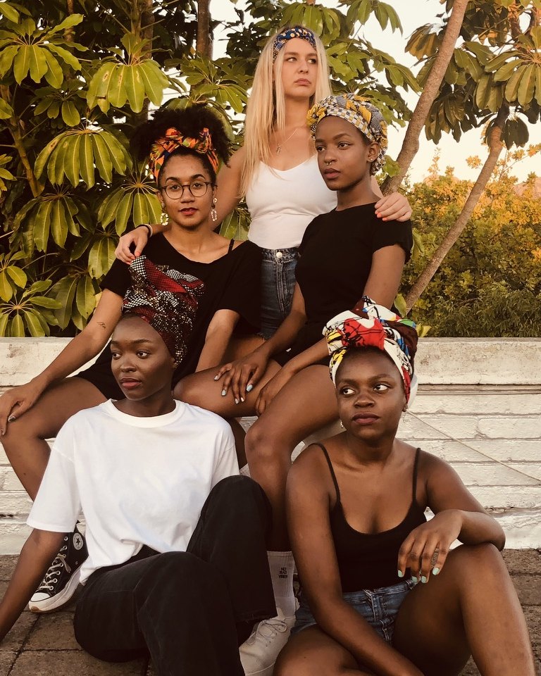 FLOWW headwraps worn by five women